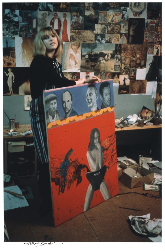 Pauline Boty with her painting Scandal '63 by Michael Ward, 1964